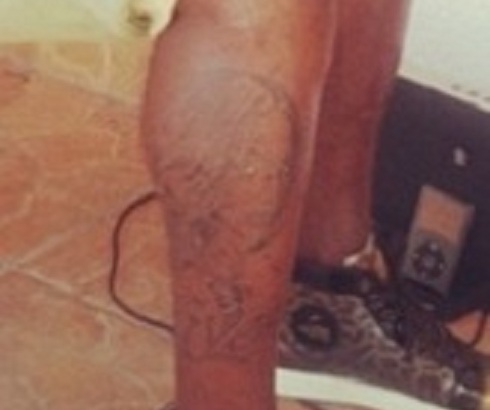 A Zoom of Ochocinco's tattoo of Evelyn Lozada's face on his calf