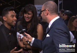 Miguel backstage at the billboard music awards
